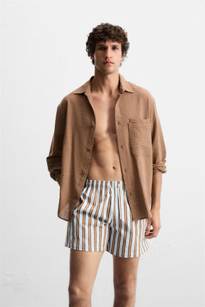 STRIPED MID-LENGTH SWIMMING TRUNKS - Image 2