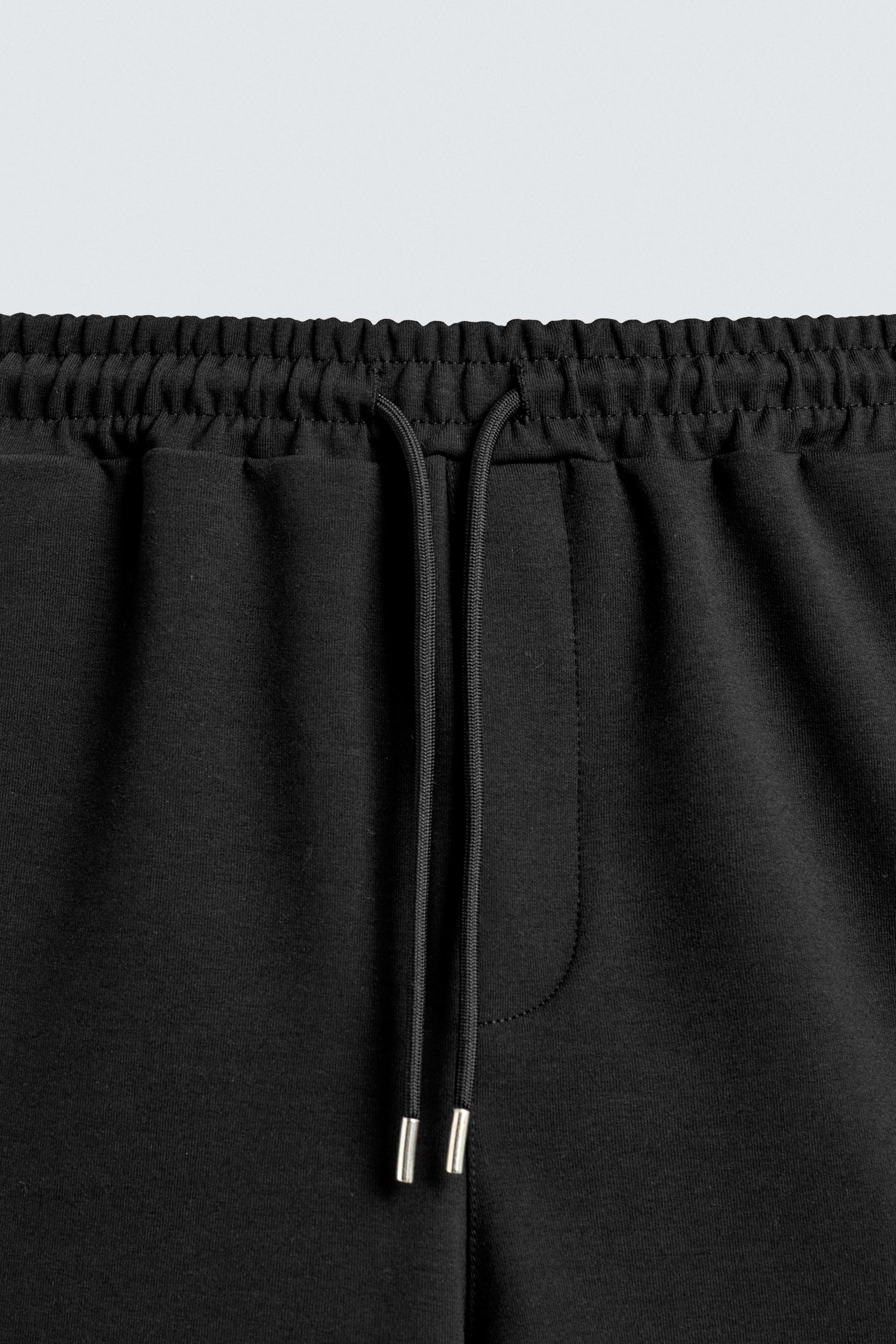 INTERLOCK BERMUDA SHORTS WITH LABEL - Image 9