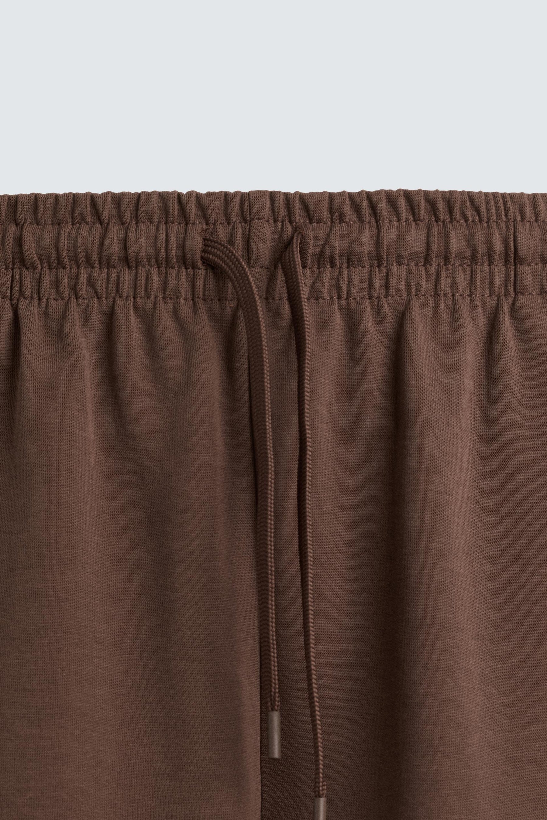 TECHNICAL INTERLOCK BERMUDA SHORTS - Image 8