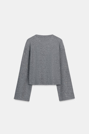 Glitzernder Rippenpullover