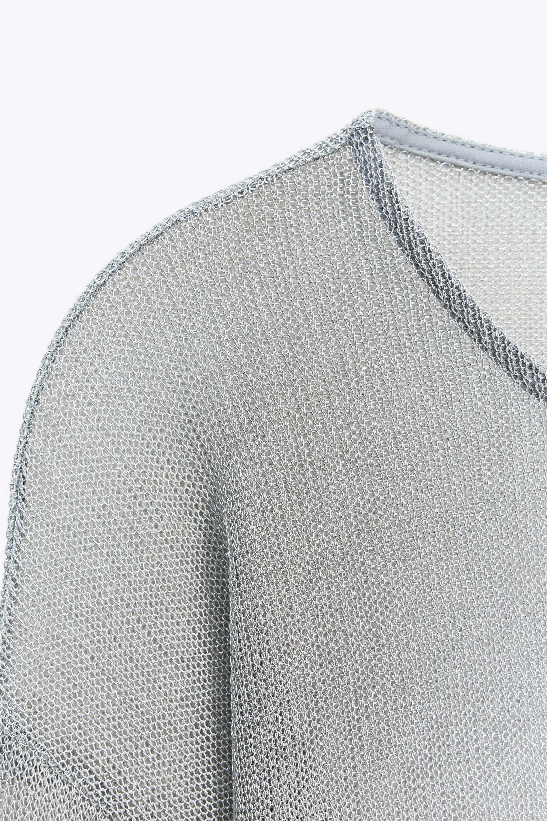 Fledermausflügel-Top aus Metallfaden