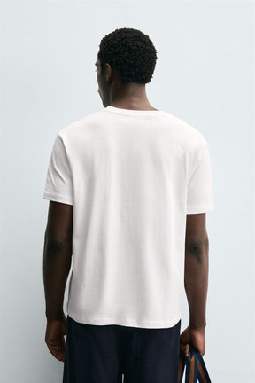 T-Shirt mit Schriftzug und Grafik