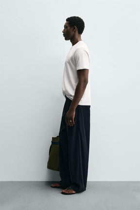 T-Shirt mit Schriftzug und Grafik