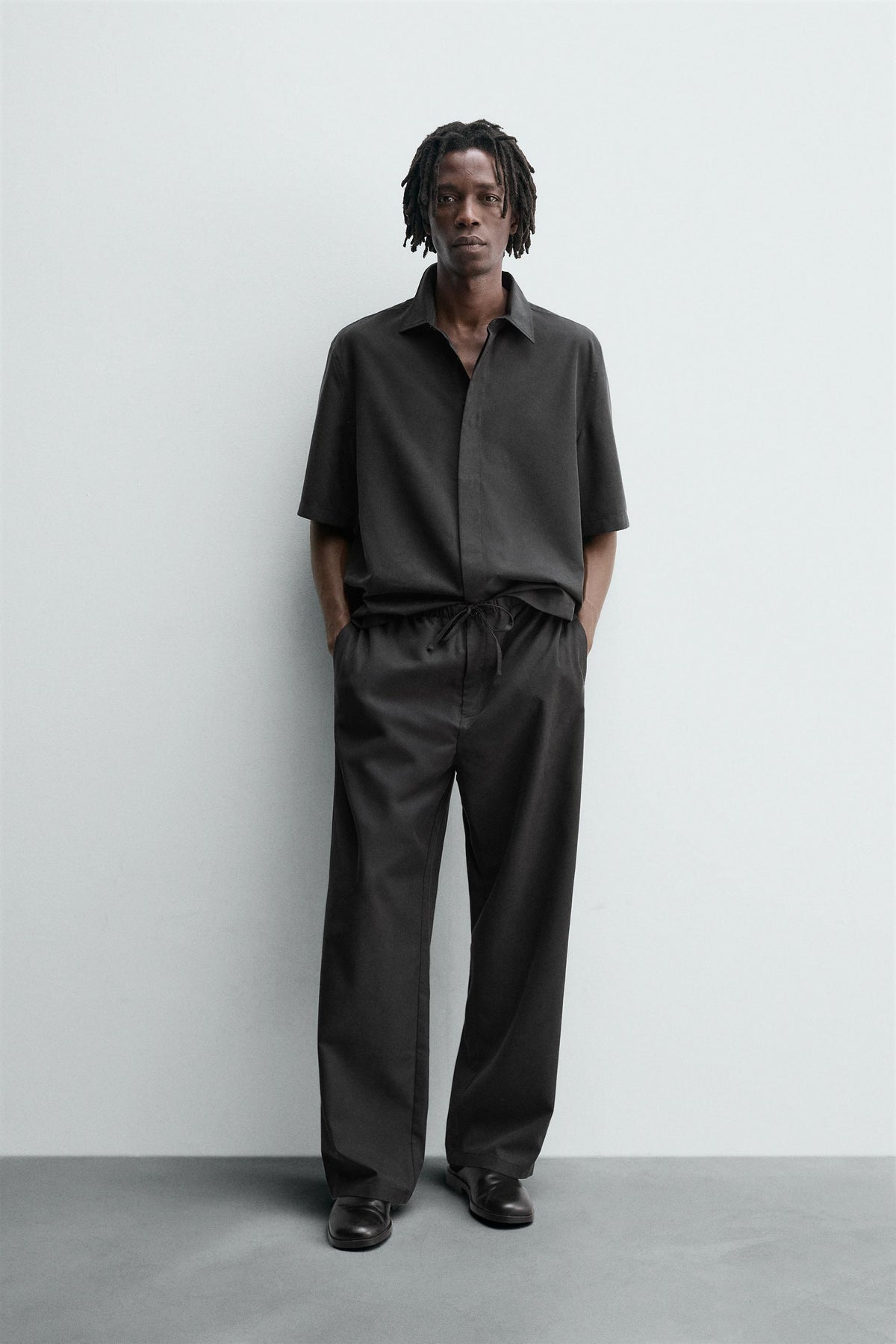FLOWING RELAXED FIT TROUSERS - Image 1