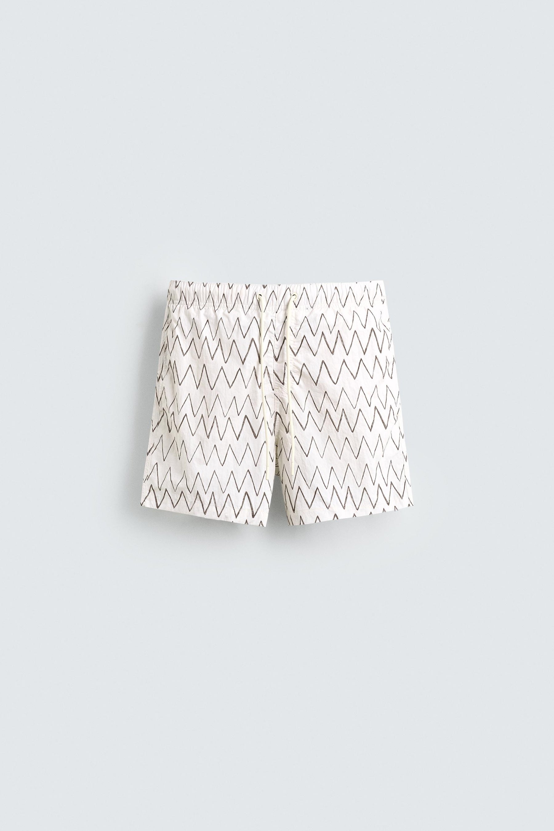 GEOMETRIC PRINT MID-LENGTH SWIMMING TRUNKS - Image 1
