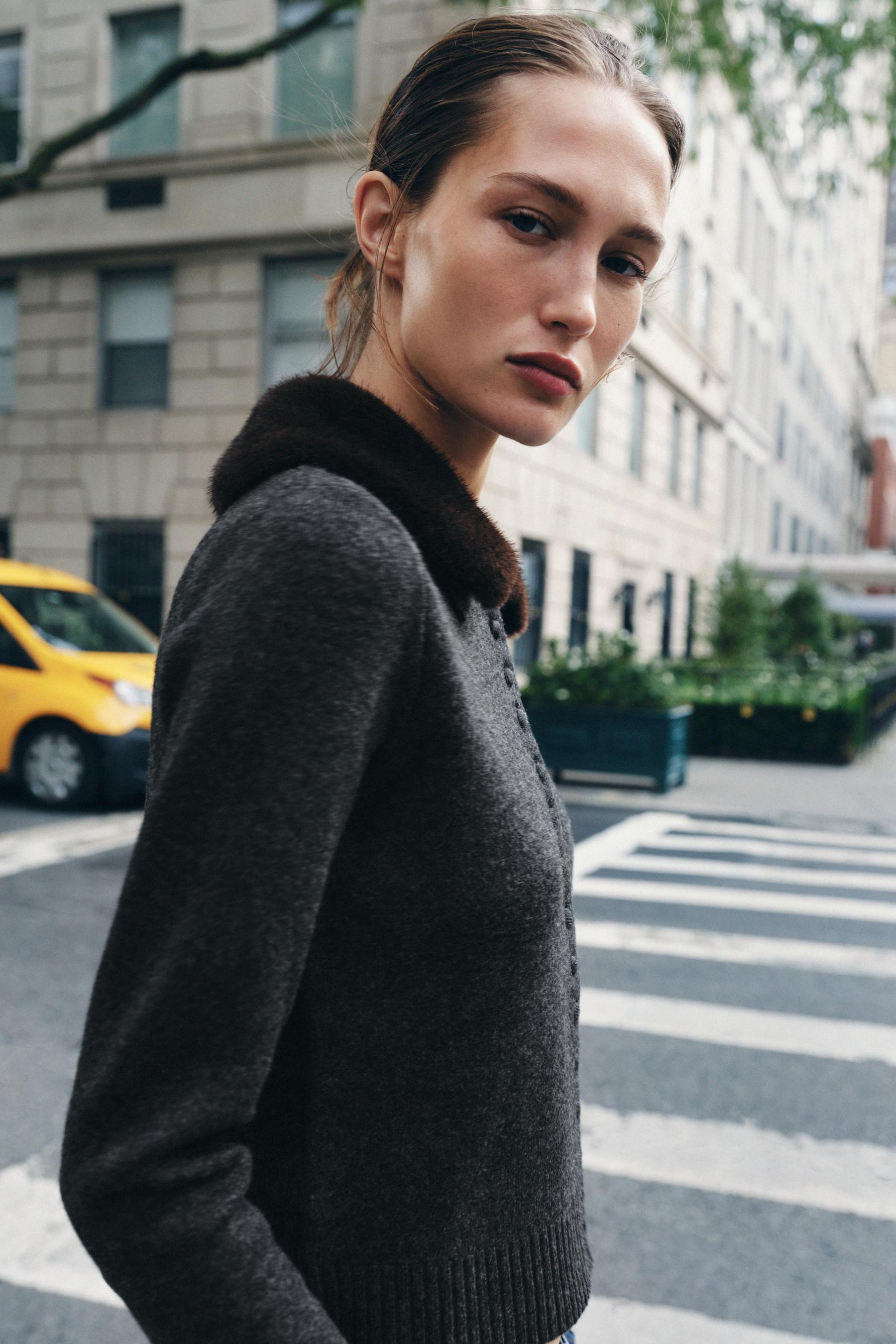 Cardigan mit Kunstpelzrevers