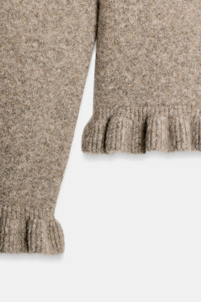 Strickjacke mit Rüschenbesatz