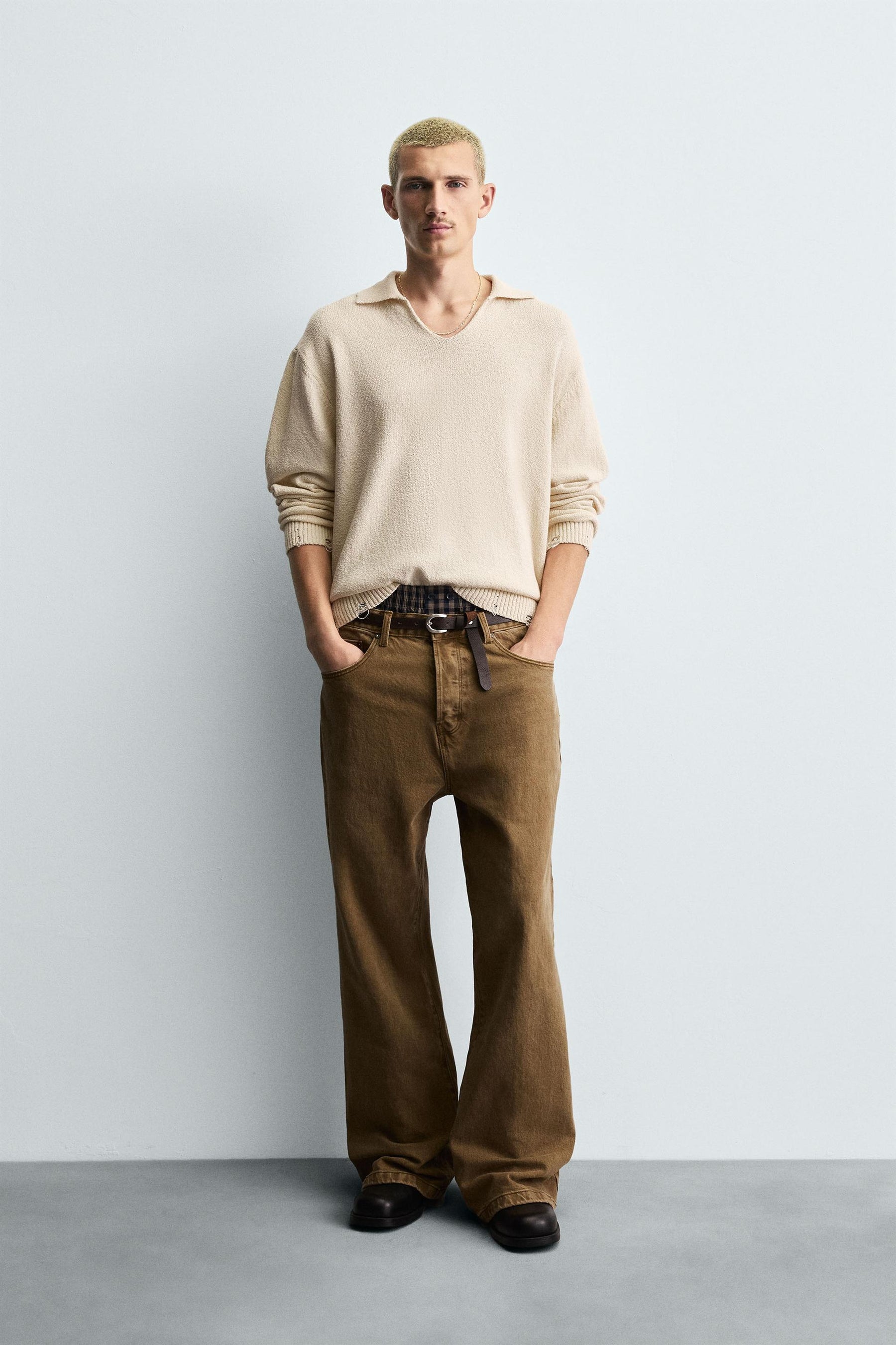 KNITTED RIPPED-EFFECT POLO SHIRT - Image 1