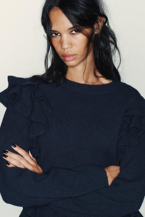 Rüschenstrickpullover