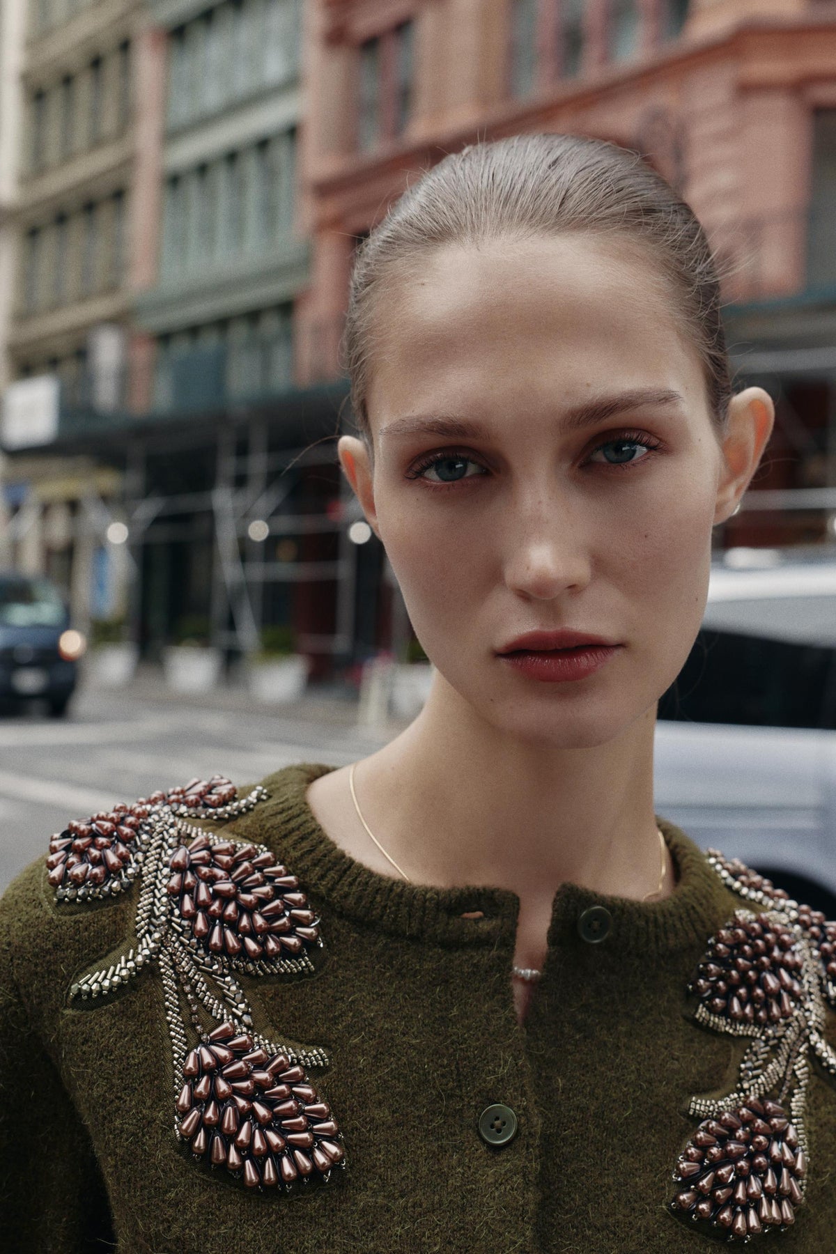 Perlenbesetzte Strickjacke