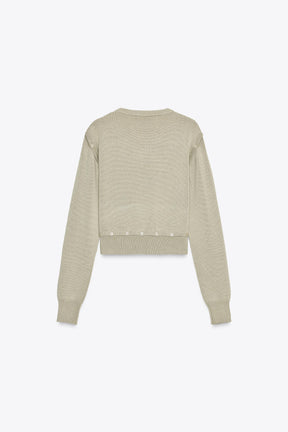 Strickpullover mit Knöpfen