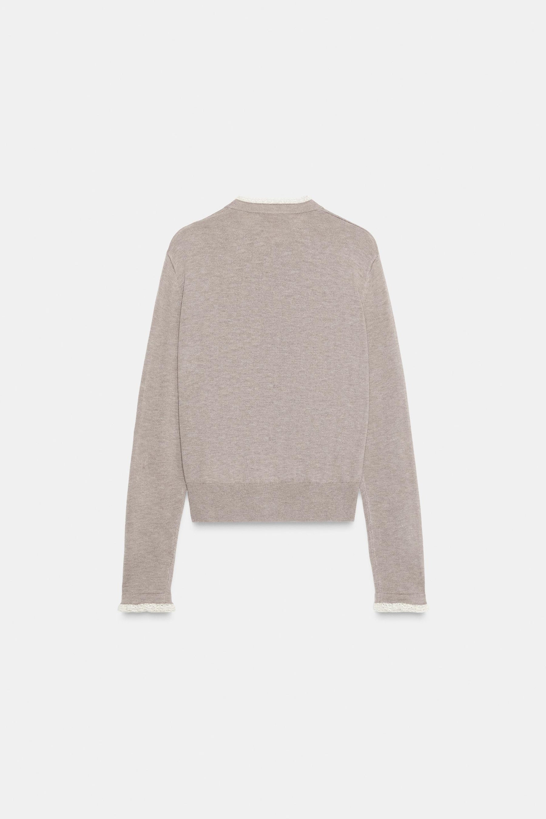 Strickjacke mit Spitzenbesatz