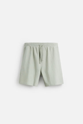 TEXTURED JOGGER BERMUDA SHORTS - Image 7
