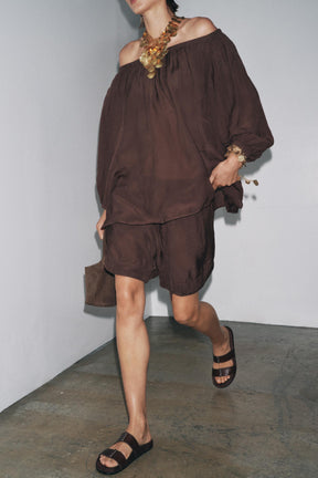 Modisches schulterfreies Top