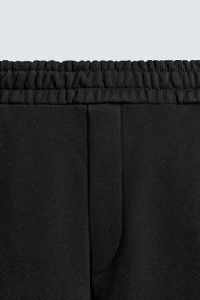 BALLOON TROUSERS WITH TWISTED SEAMS - Image 8