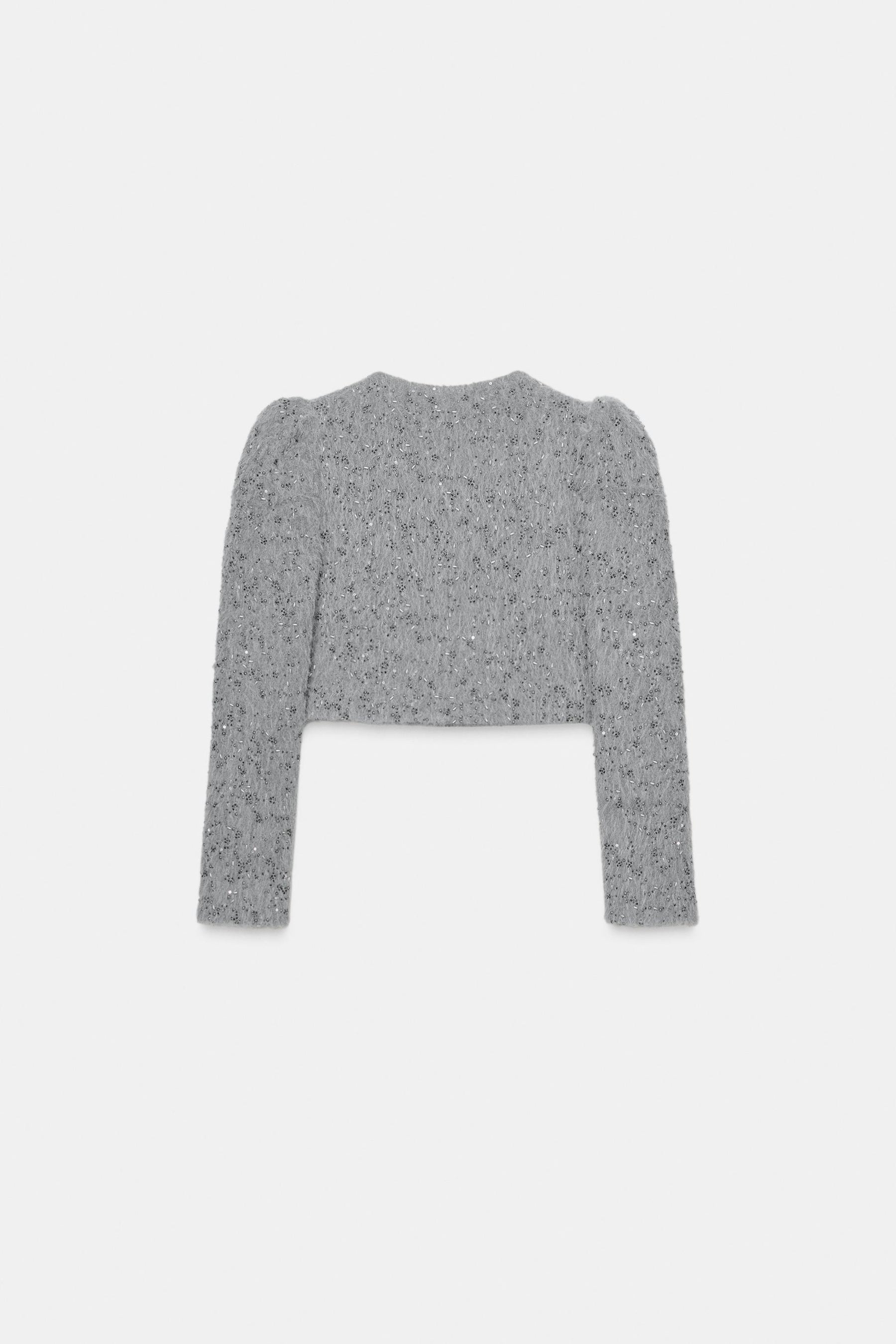 Perlenbesetzte Schaffelljacke