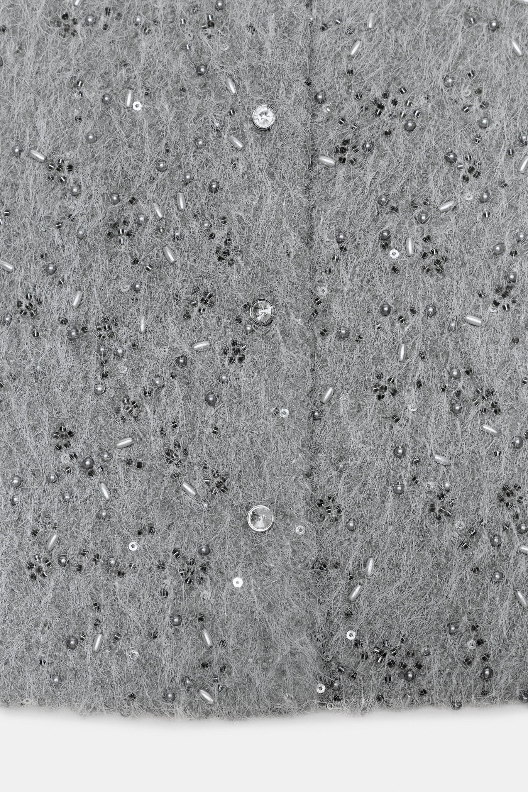 Perlenbesetzte Schaffelljacke