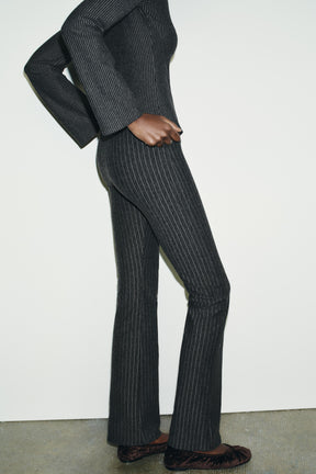 Nadelstreifen-Schlaghosen