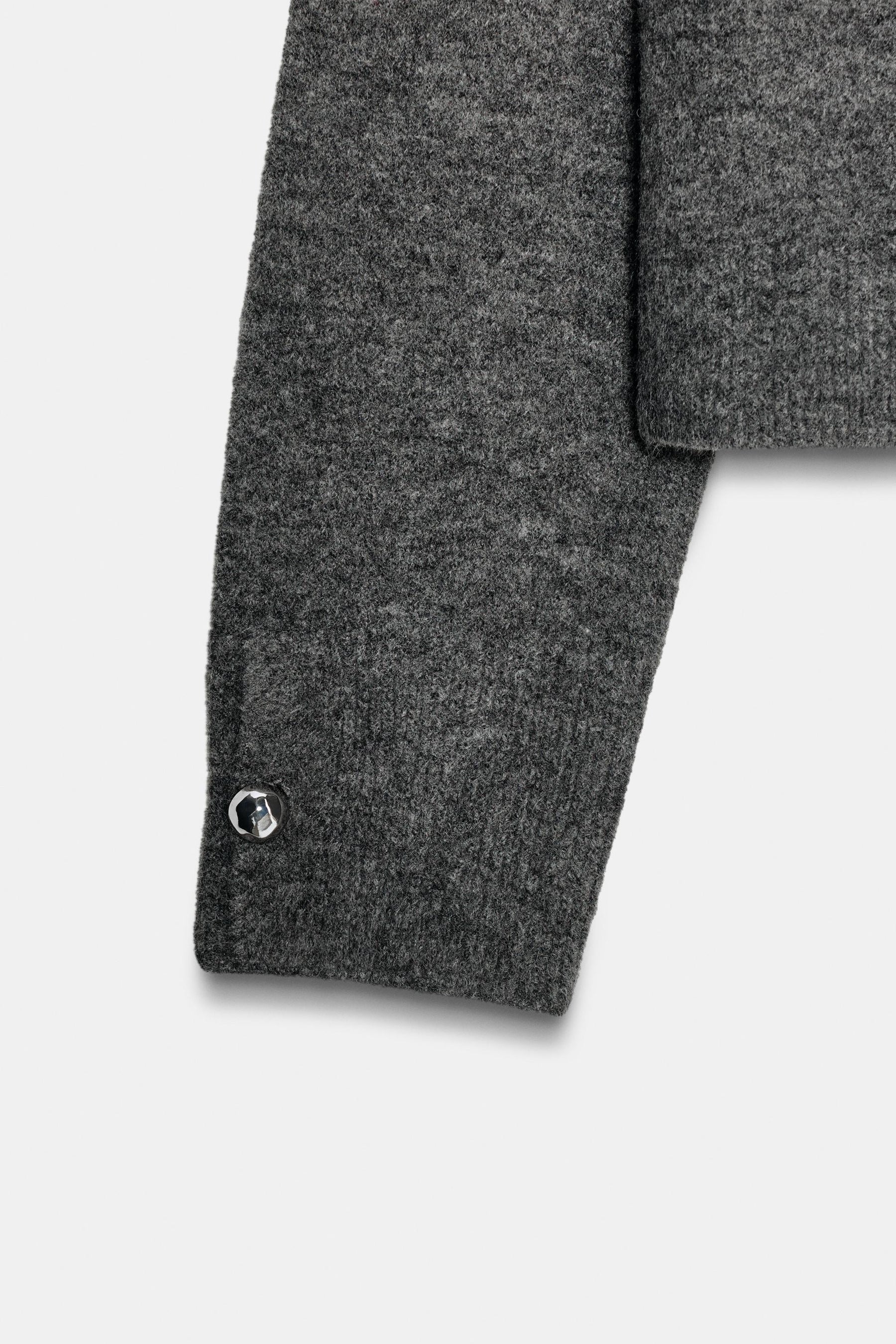 Strickpullover mit Knöpfen