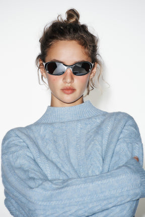 Wollpullover mit Zopfmuster