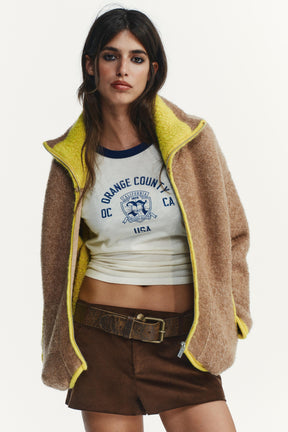 Strickjacke mit kontrastierendem Besatz