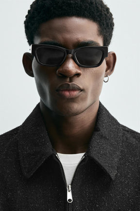 Glänzende, strukturierte Jacke 