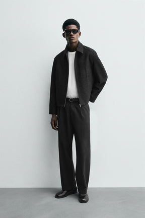 Glänzende, strukturierte Jacke 