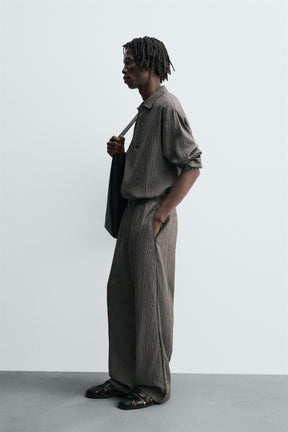 STRIPED WRINKLED-EFFECT FLOWING TROUSERS - Image 4