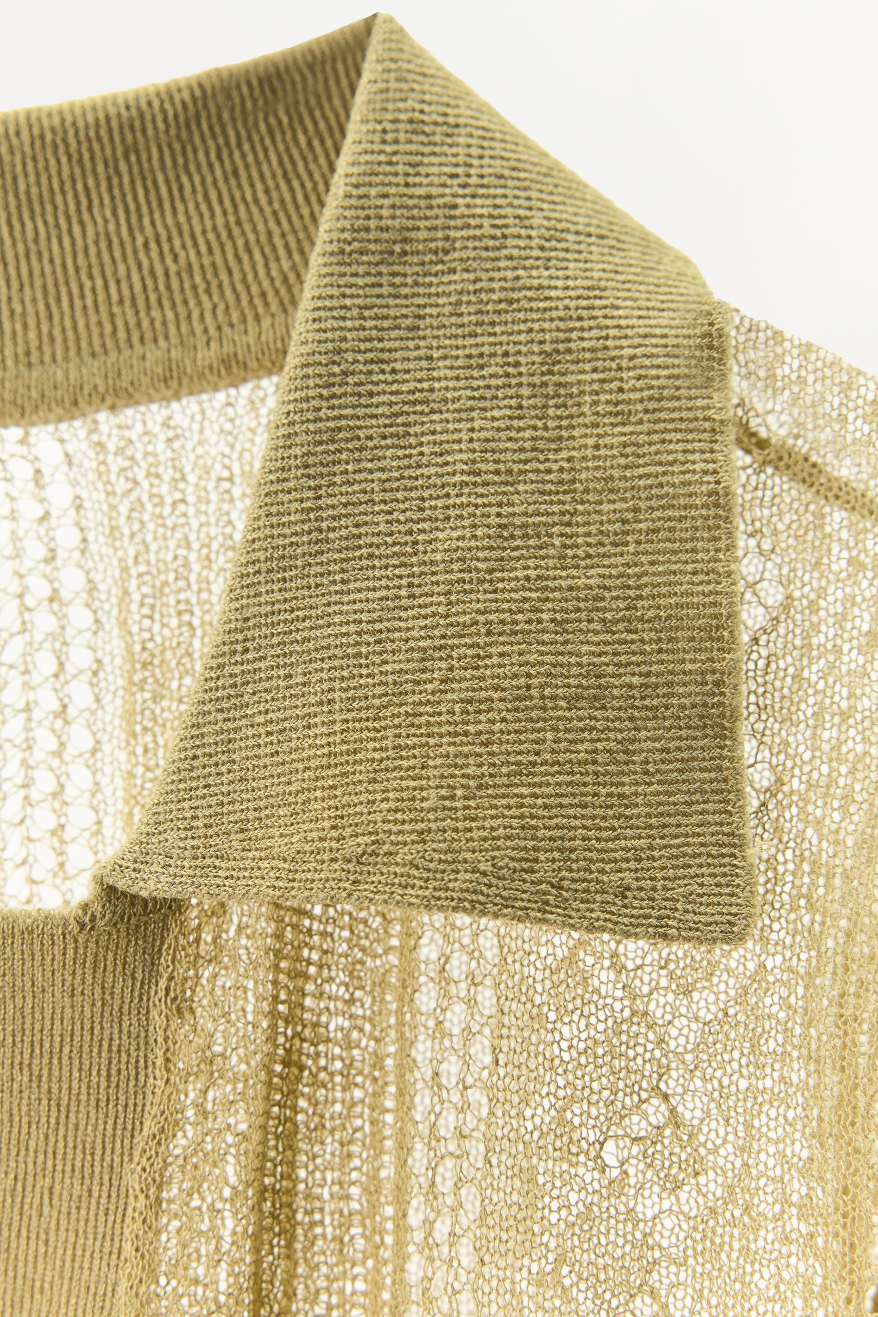 Poloshirt mit Cutwork-Strickmuster