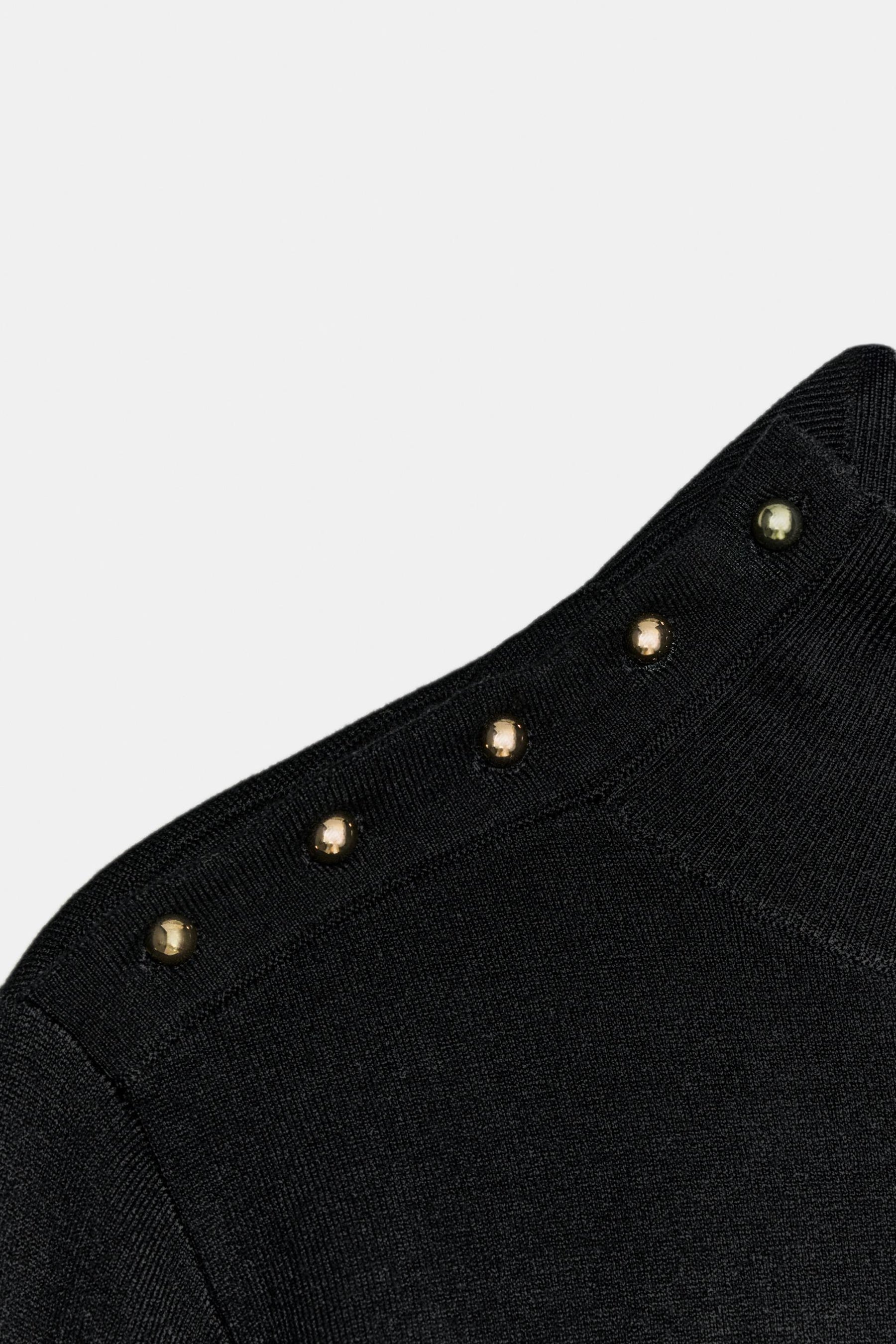 Strickpullover mit Knöpfen