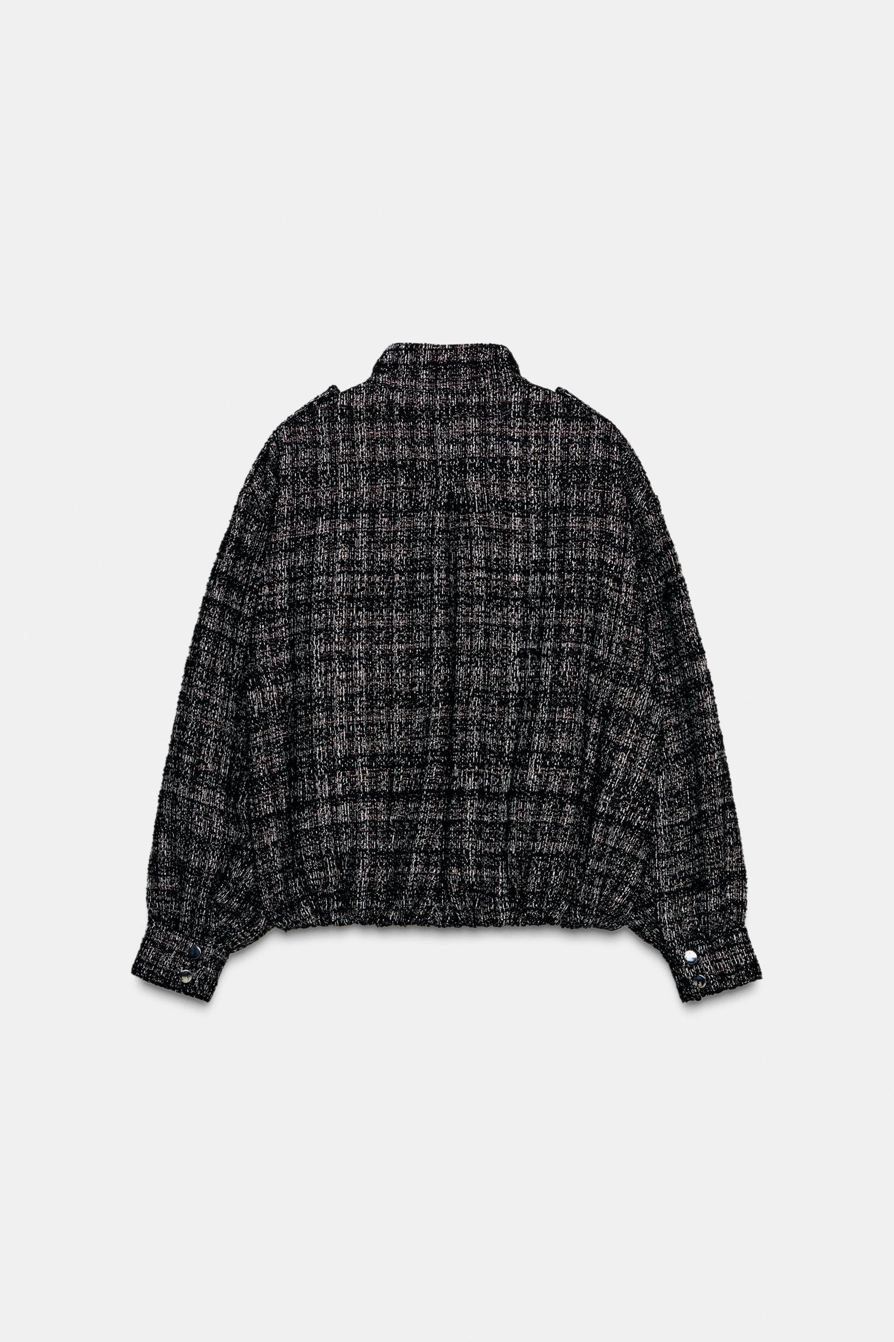 Bomberjacke mit metallischer Struktur