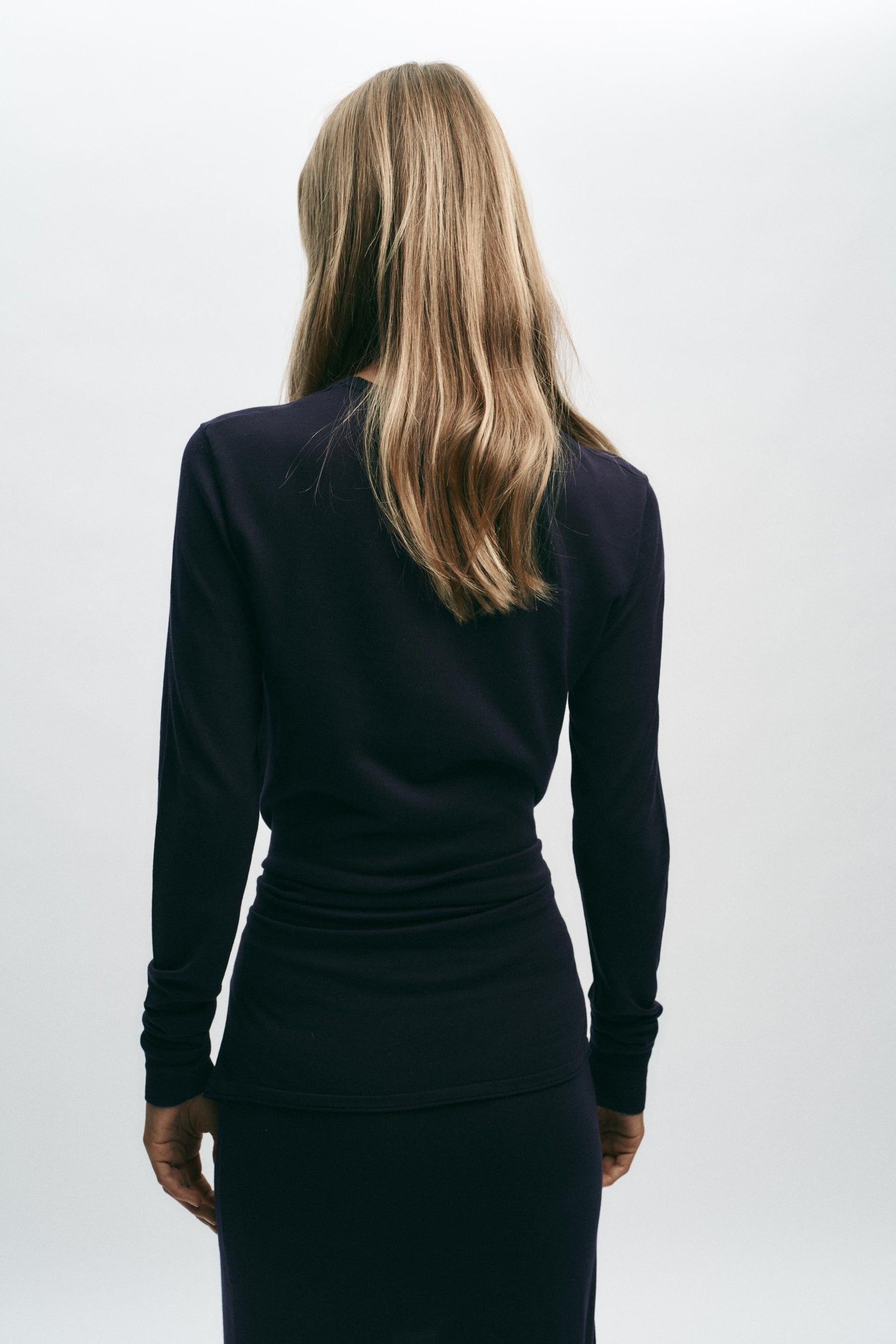 Strickpullover mit Knoten