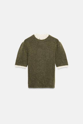 Wollpullover mit Rüschen