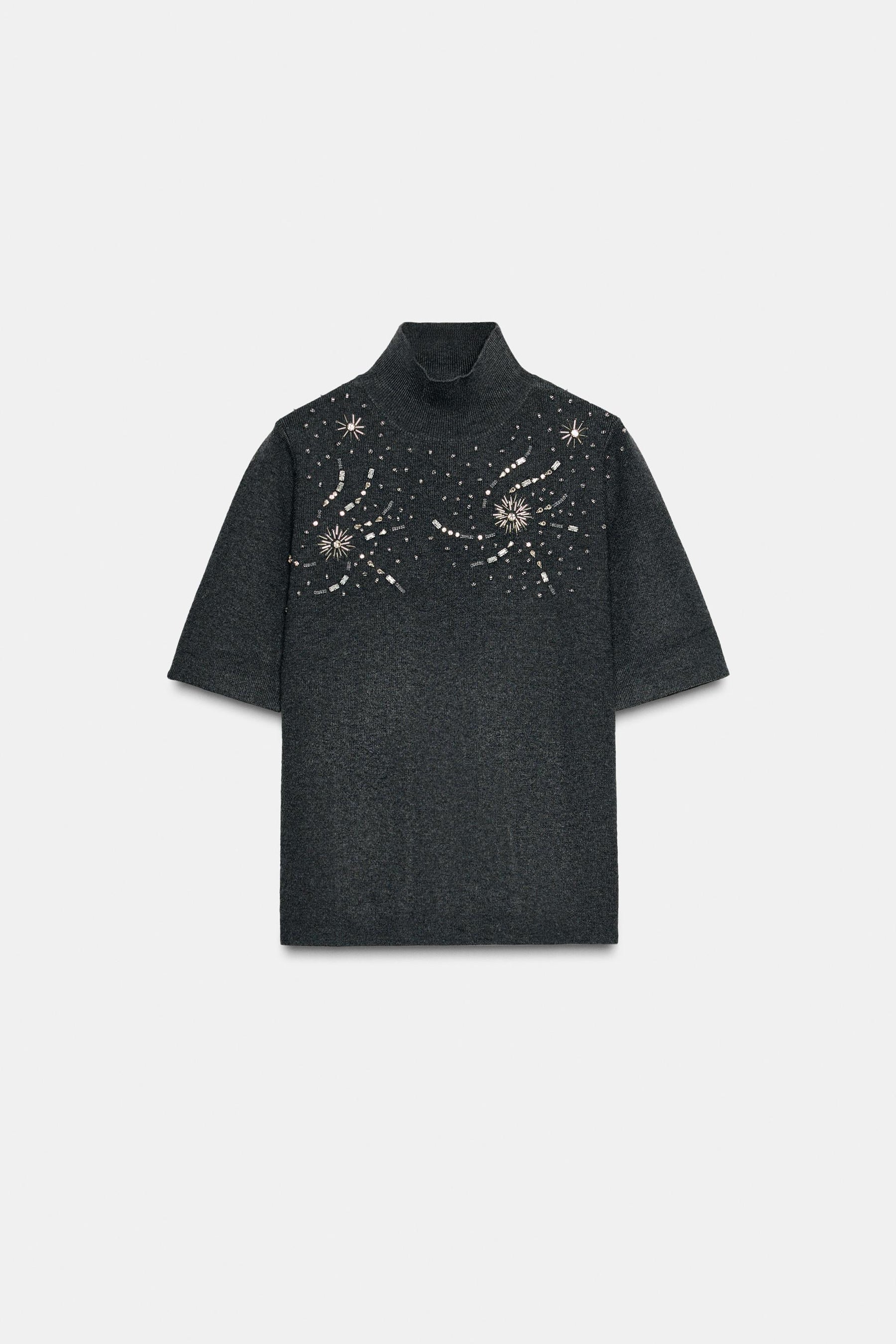 Perlenbesetzter Strickpullover