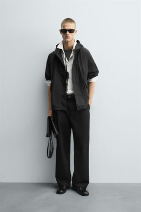 TECHNICAL HOODED JACKET - Image 1