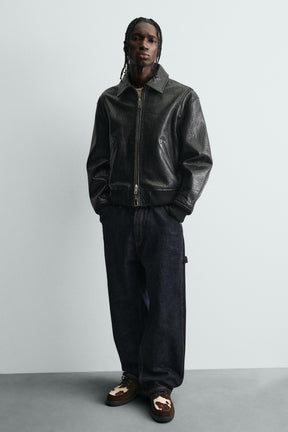 Schuhe aus Leder mit Tiermuster