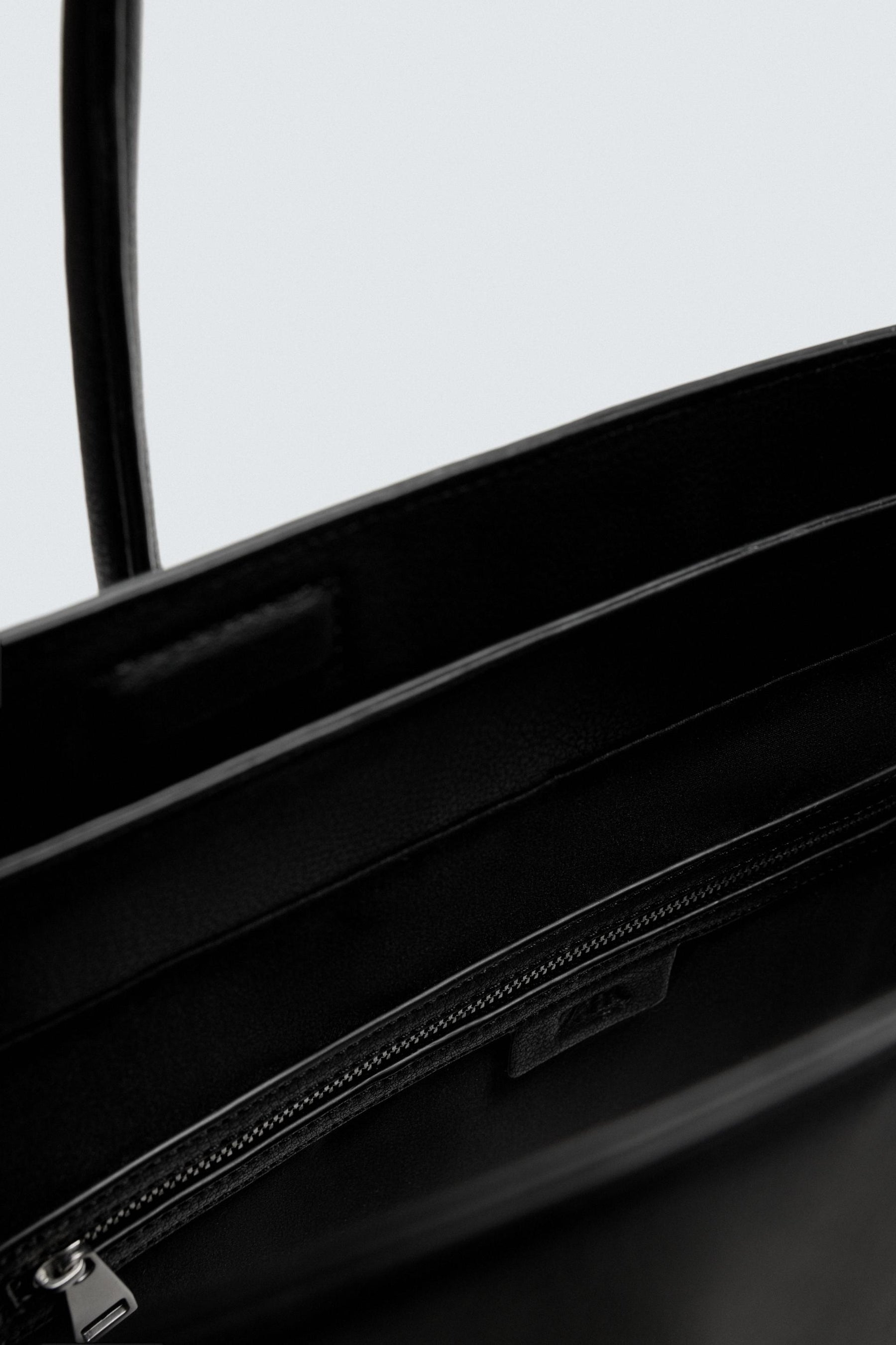 GÜRTELTE HANDTASCHE