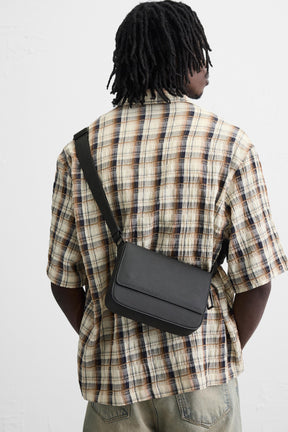 RUBBERISED TEXTURED CROSSBODY BAG - Image 1