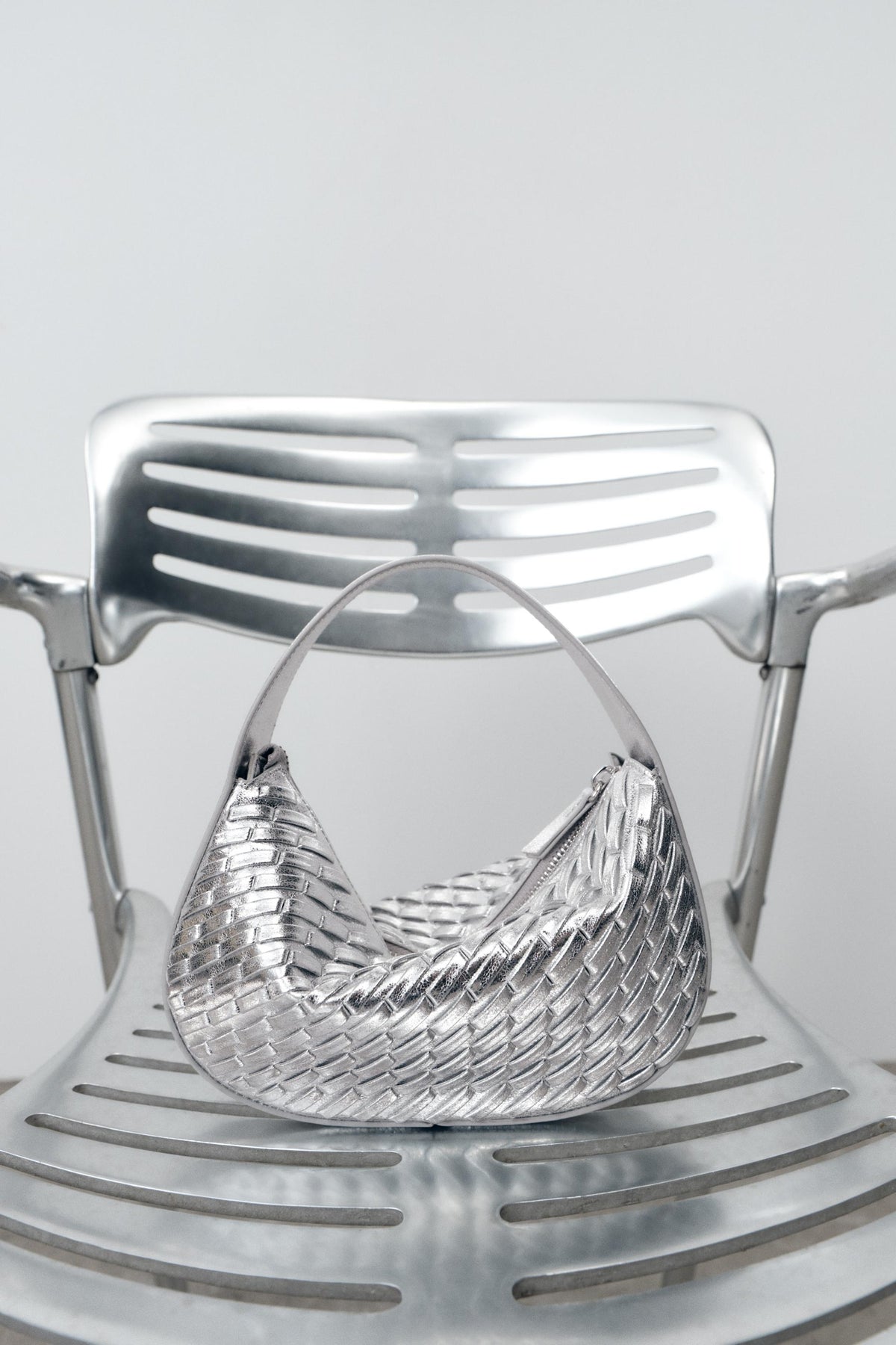 GEFLOCHTENE HANDTASCHE