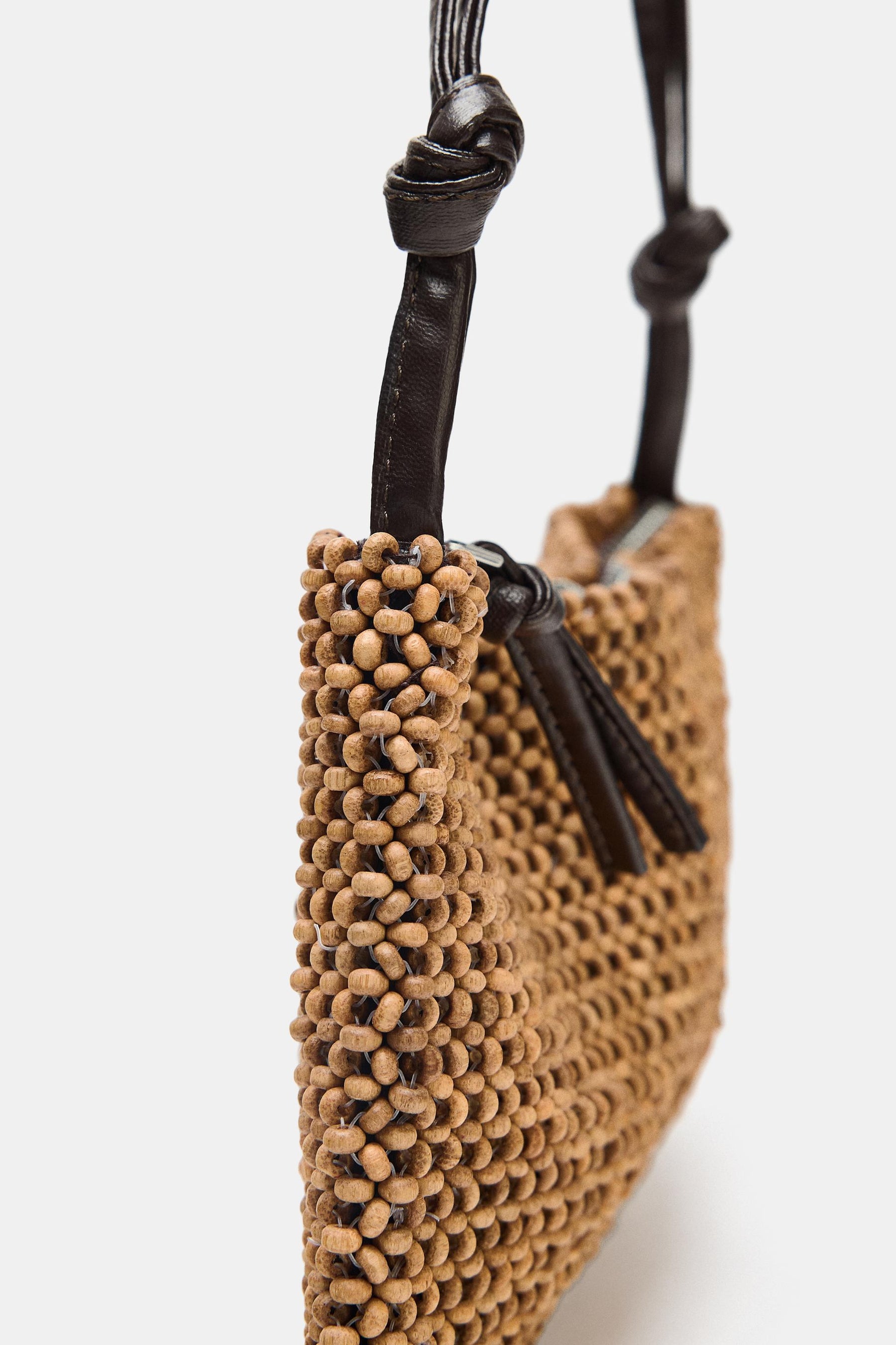 Perlenbesetzte Schultertasche