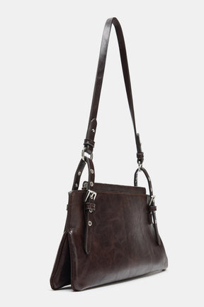 Nietenbesetzte Schultertasche